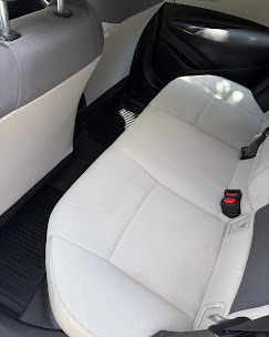 White cloth seats deep cleaned